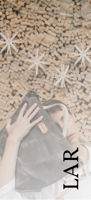 a woman holding a purse