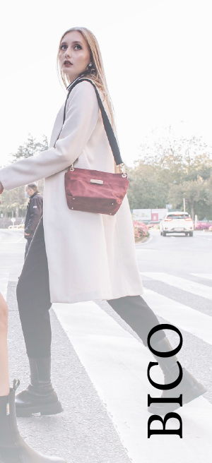 a woman crossing a street